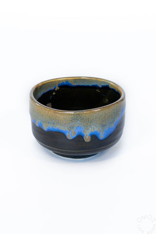 Ceramic matcha chawan bowl, dark charcoal with blue drip glaze rim