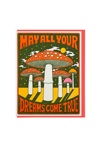 Colorful greeting card with “May All Your Dreams Come True” text and UFO illustration