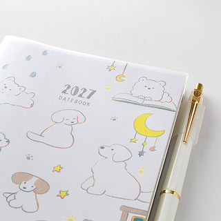 Midori 2027 datebook planner cover close-up with animal illustrations and pen