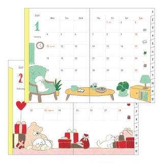Midori 2027 calendar page with pet scene and gift items on the month grid