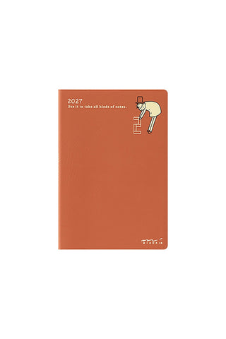 Midori 2027 B7 monthly planner, orange textured cover with small character illustration
