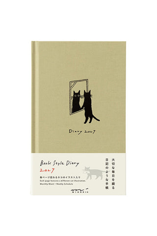 Beige B6 diary planner with black cat illustration and “Diary 2027” on cover