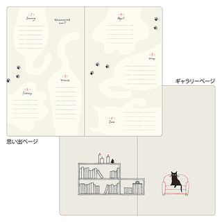Open planner with themed sections, cat paw accents, and bookshelf drawing on divider