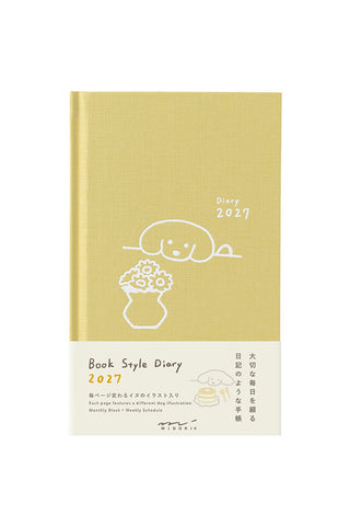 Yellow 2027 monthly diary planner with fluffy dog line-art cover and icons