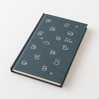 Navy B6 weekly diary planner with fluffy dog icons and 'Diary 2027'