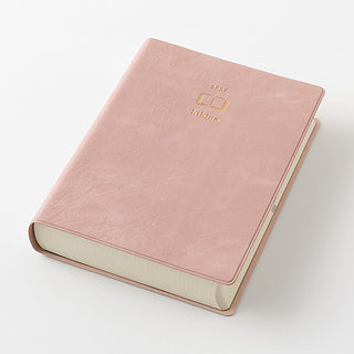 Pink A6 two-page-a-day planner closed with Hibino logo on front cover