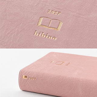 Pink A6 two-page-a-day planner cover with gold 2027 Hibino logo