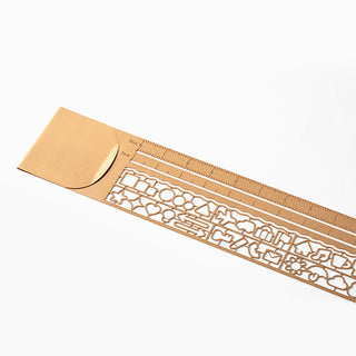 Copper clip ruler with engraved measurement scale and long decorative stencil strip