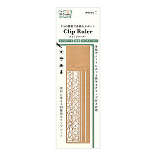 Midori Chiratto clip ruler in package, copper-toned insert with stencil cutouts