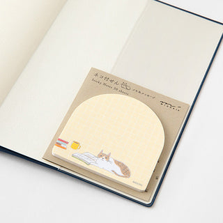 Midori sticky notes book with rounded die-cut notes, beige grid and sleeping cat