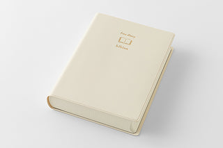 Ivory A6 two-page-a-day diary closed with embossed Hibino branding