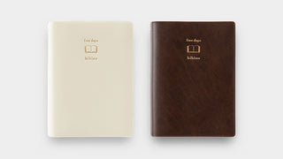 Two-page-a-day free diary set: ivory and brown covers with “hibino” logo.