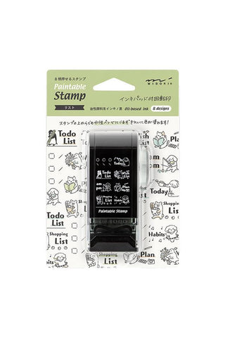 Paintable rotary stamp dial with animal list motifs, retail box and stamp shown