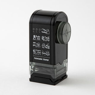 Black paintable rotary stamp with side dial and clear base showing animal list icons
