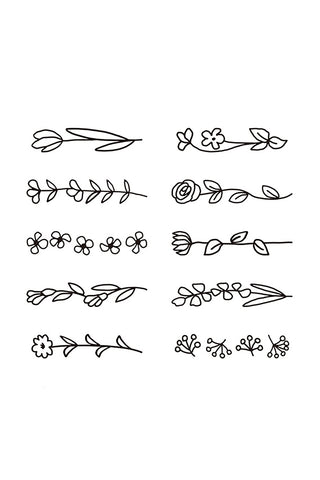 Set of black flower and leaf stamp patterns shown on a page, assorted sprigs.