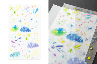 Starry sky transfer sticker sheet with watercolor clouds, fireworks, and colorful stars