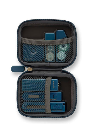 Teal mesh mini stationery kit case, open with dividers and compact tools inside