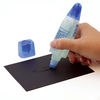 Tombow Mono Aqua liquid glue pen applying glue with blue tip