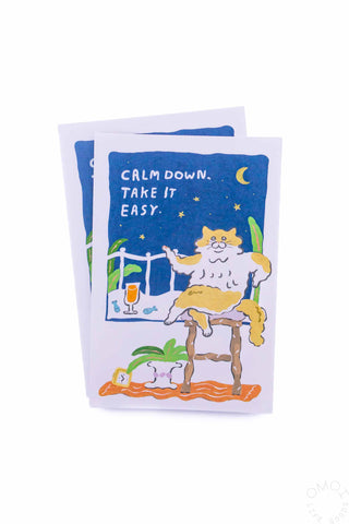 Nekoto illustrated postcard with cat by plants and water, night sky moon, text "CALM DOWN TAKE IT EASY"