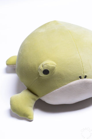 Small plush frog hugging pillow side view, lime-green head and white belly patch