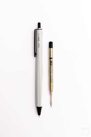 OHTO gel refill roller, 0.5mm, gold cartridge with black cap, next to pen body