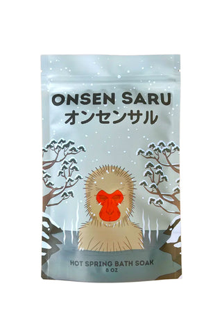 Hot spring bath soak pouch with bear illustration and waves, sealed