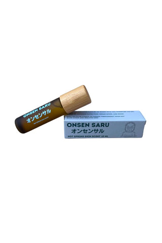 Onsen Saru hot spring skin scent bottle with bamboo cap and blue box packaging