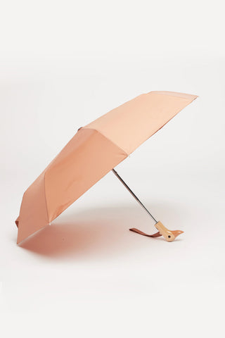 Mocha-brown compact umbrella with wooden-style duck handle and open canopy