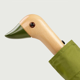 Duck-head handle on olive compact umbrella with wooden handle and green cover