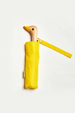 Yellow compact duck umbrella with wooden handle and duck head clasp