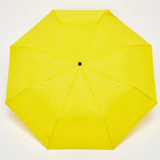 Yellow compact umbrella with eight-panel canopy and center button