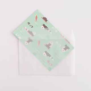 Otter letter set mint envelope featuring otter and fish illustrations with flap