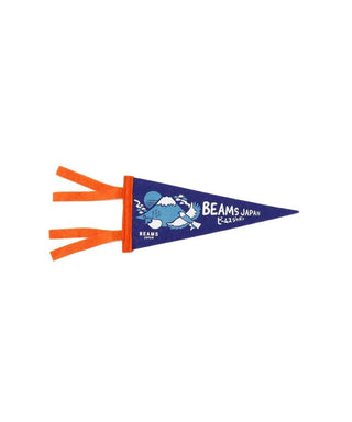 Blue triangular fabric pennant with orange fringe and BEAMS JAPAN logo.