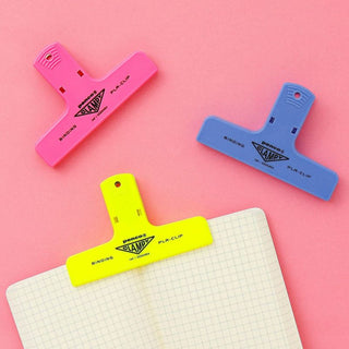 Plastic binder clips set in pink, blue, and yellow