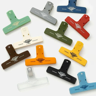 Assorted plastic binder clips in multiple colors