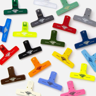 Assorted plastic binder clips, multi-color layout