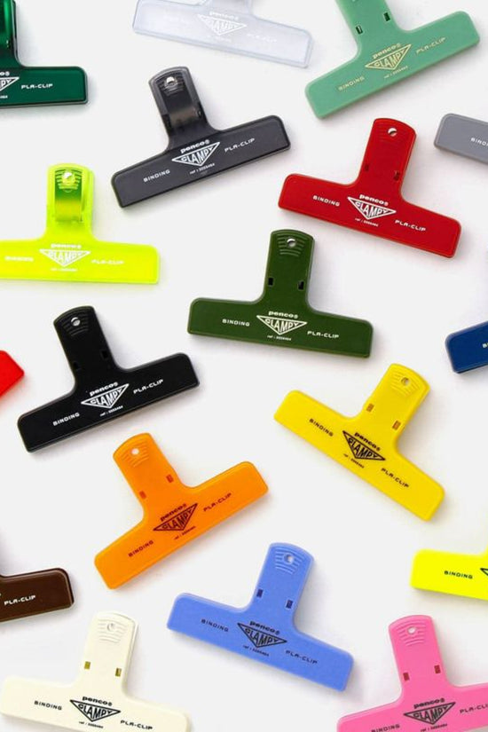 Assorted plastic binder clips, multi-color layout