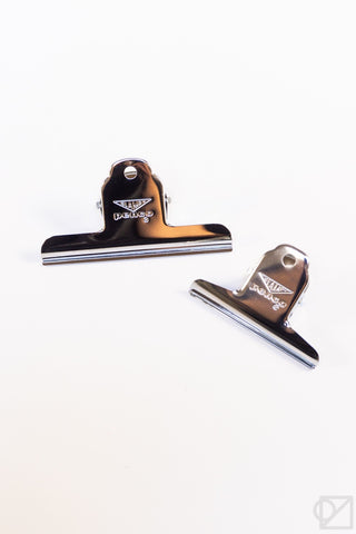 Silver steel binder clip, Clampy style with brown label loop