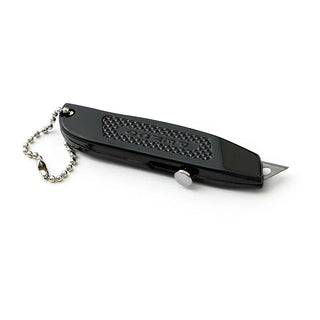 Black pocket utility knife with textured grip panel and keychain lanyard