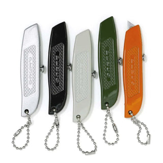 Assorted pocket utility knives in white, black, gray, olive green, and orange