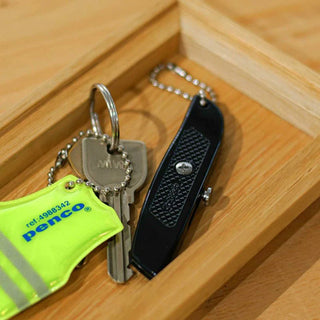 Green pocket utility knife with keychain lanyard and spare blades pouch