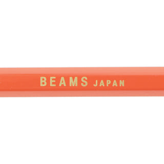 Orange mechanical pencil barrel with BEAMS JAPAN printed text