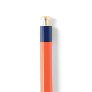 Orange mechanical pencil with blue band and gold top cap