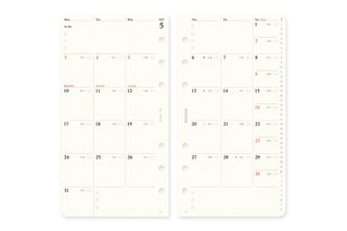 Monthly schedule refill pages with day numbers and appointment blocks, punched holes