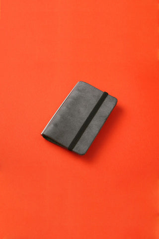 Gray fabric band with black side strap, slim folded holder