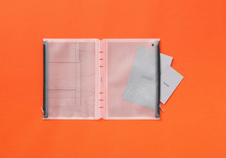 PLOTTER A5 fastener case open with gray grid inserts and loose paper pocket pieces