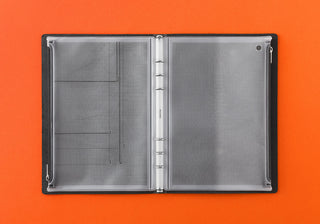 Closed PLOTTER A5 fastener case with black cover and gray perforated mesh interior
