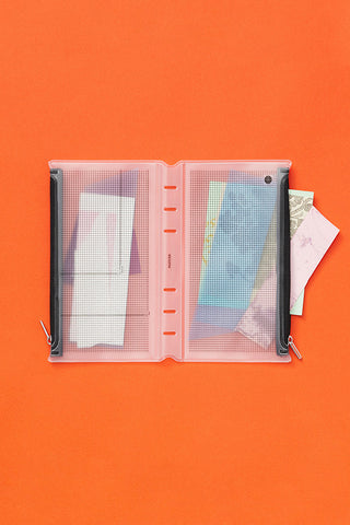 Bible-size fastener case opened flat, light gray pocket panels with metal fasteners