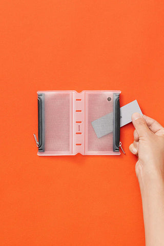 Mini fastener case, open, gray mesh pages with side rings and clips