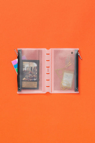 Opened mini fastener case with mesh pockets and side pull tabs